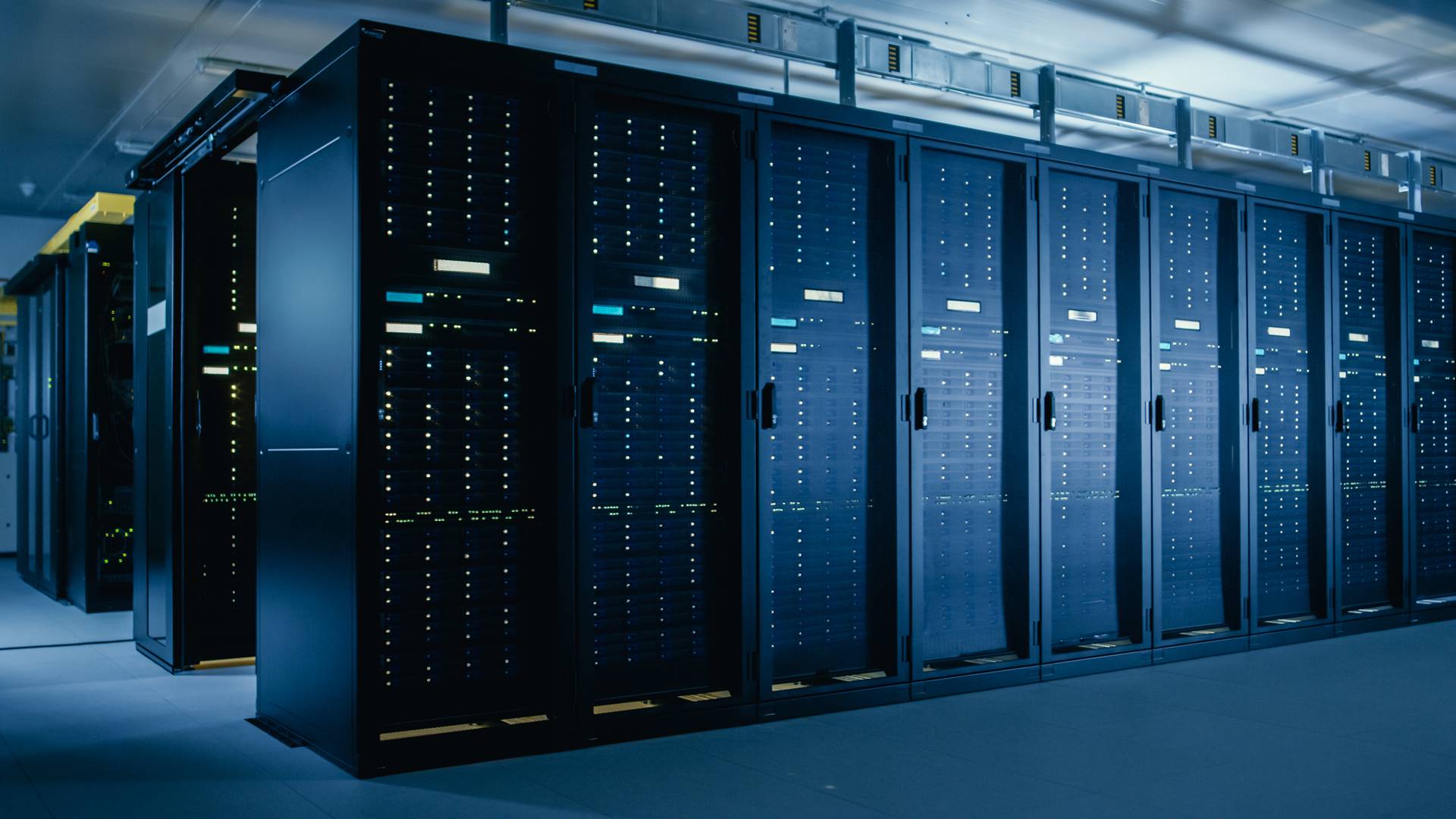 Shot of Data Center With Multiple Rows of Fully Operational Server Racks. Modern Telecommunications, Cloud Computing, Artificial Intelligence, Database, Super Computer Technology Concept.